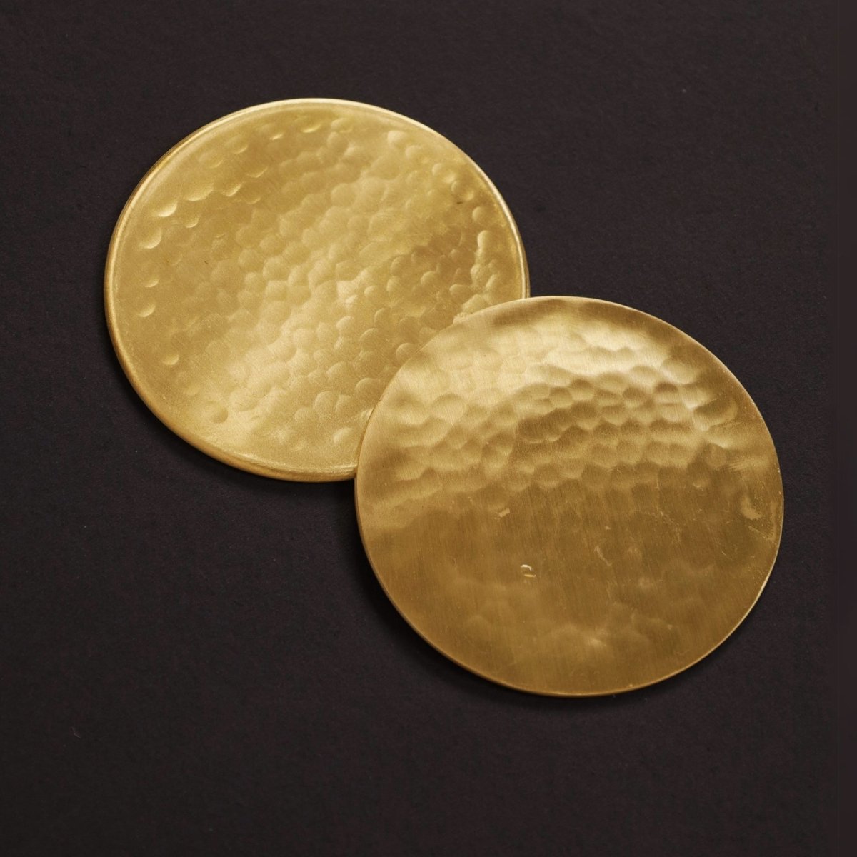 Handcrafted Pure Brass table coaster set with traditional etching, ideal for kitchen and table, adding timeless Indian elegance.