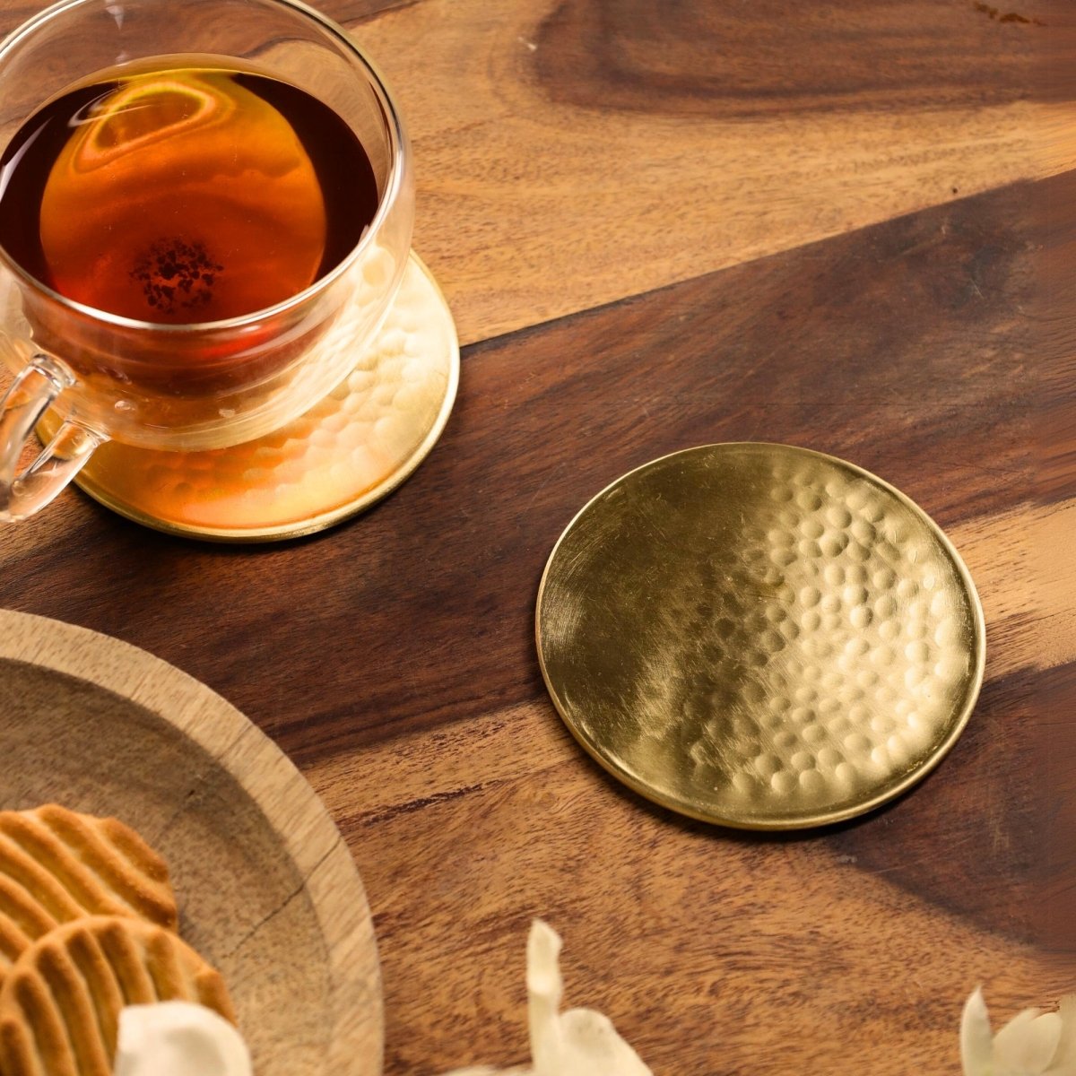 Handcrafted Pure Brass table coaster set with traditional etching, ideal for kitchen and table, adding timeless Indian elegance.
