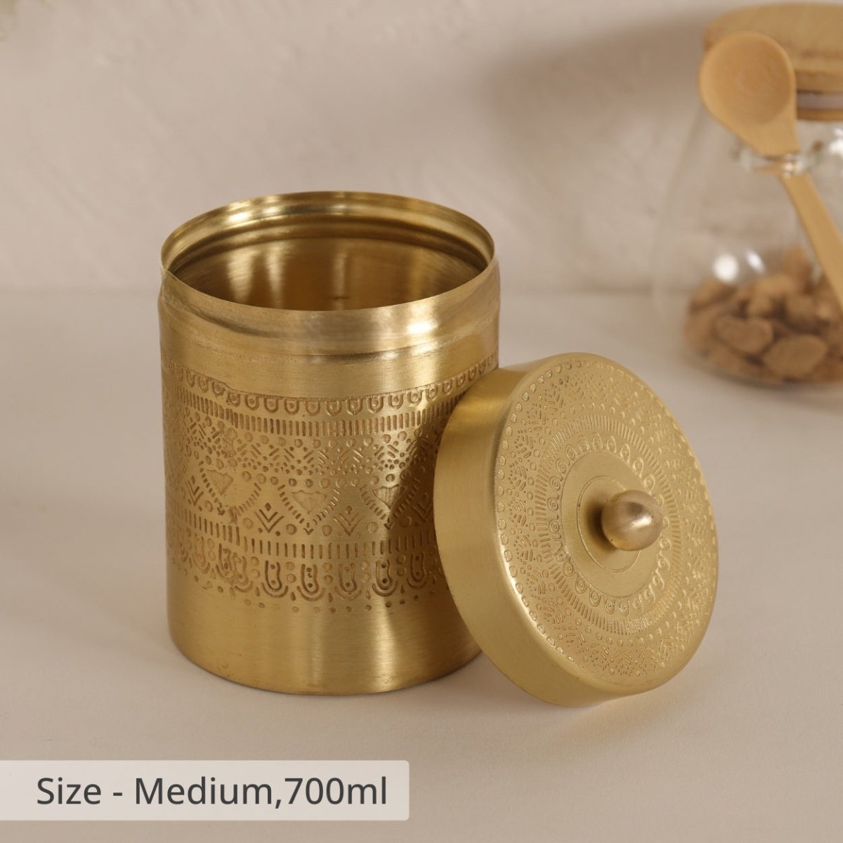 Handcrafted pure brass storage jar with traditional etching, ideal for kitchen storage, adding timeless Indian elegance.