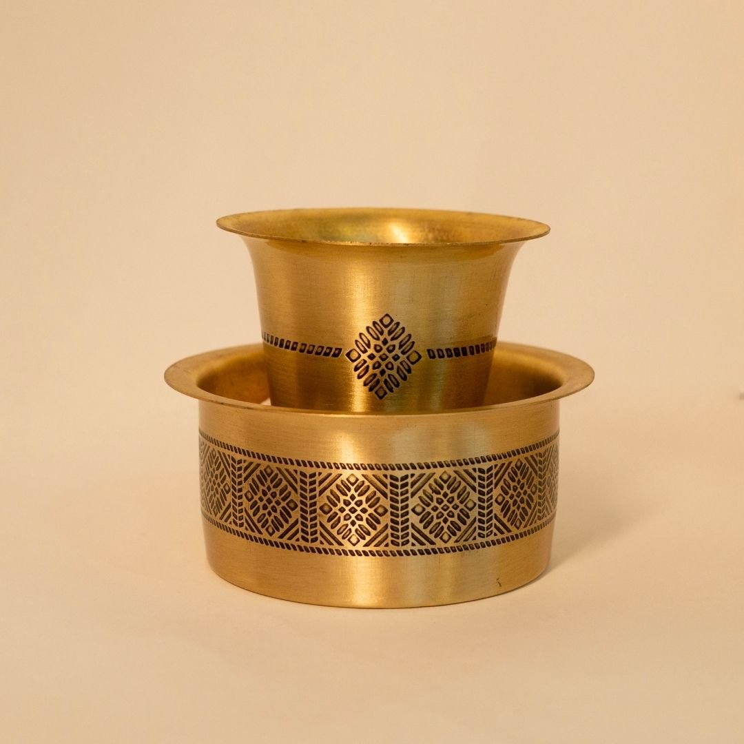 Handcrafted pure brass kitchen masala box with Kanjeevaram-inspired etching, adding timeless Indian elegance.