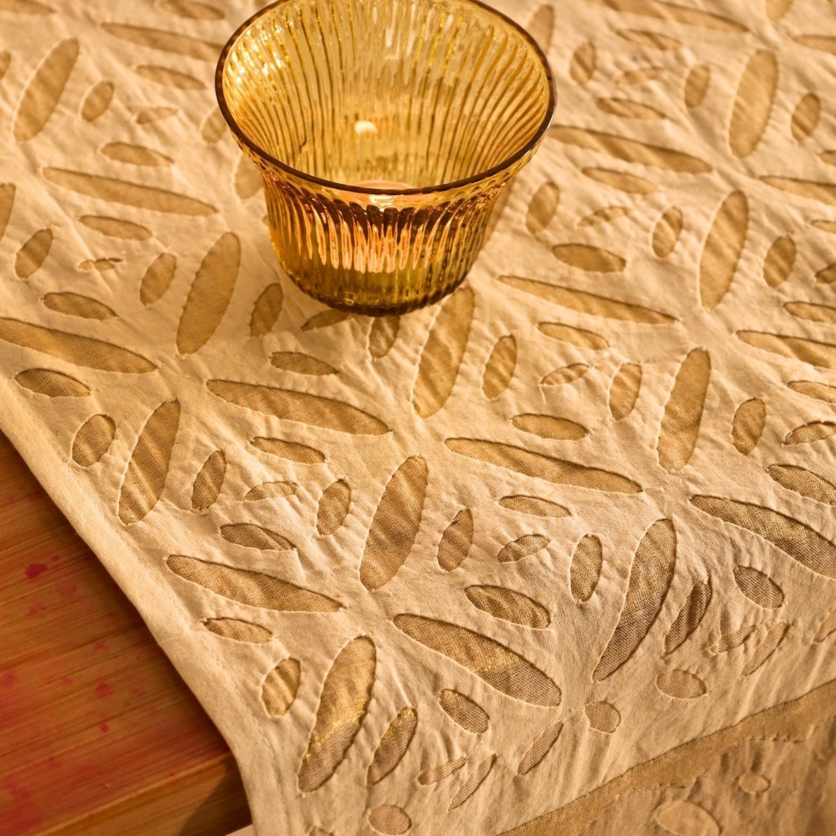 Elegant off white and taupe table runner featuring intricate appliqué work. Handcrafted for timeless dining décor—perfect for modern and classic homes.