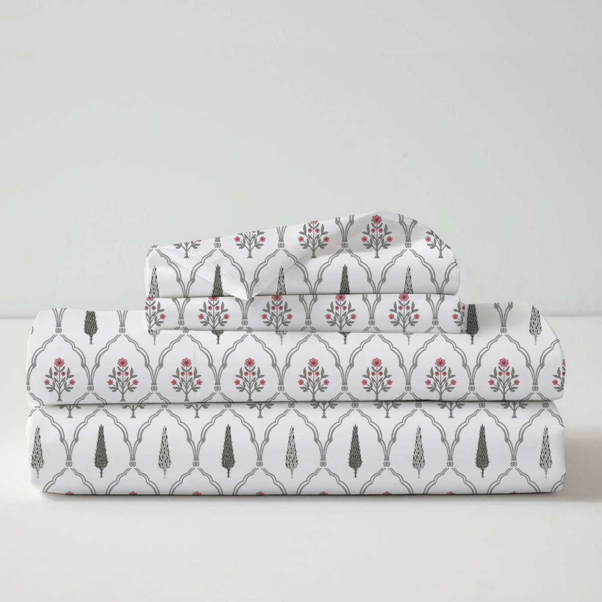 Pink Pure Cotton Double Bed sheet set in Cypress design & 4 Hand engraved Candleholders. A premium gift for friends and family.