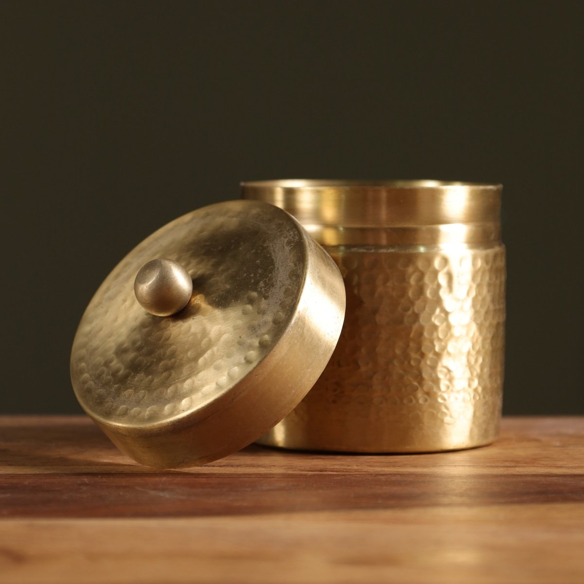 Handcrafted pure brass storage jar with traditional etching, ideal for kitchen storage, adding timeless Indian elegance.