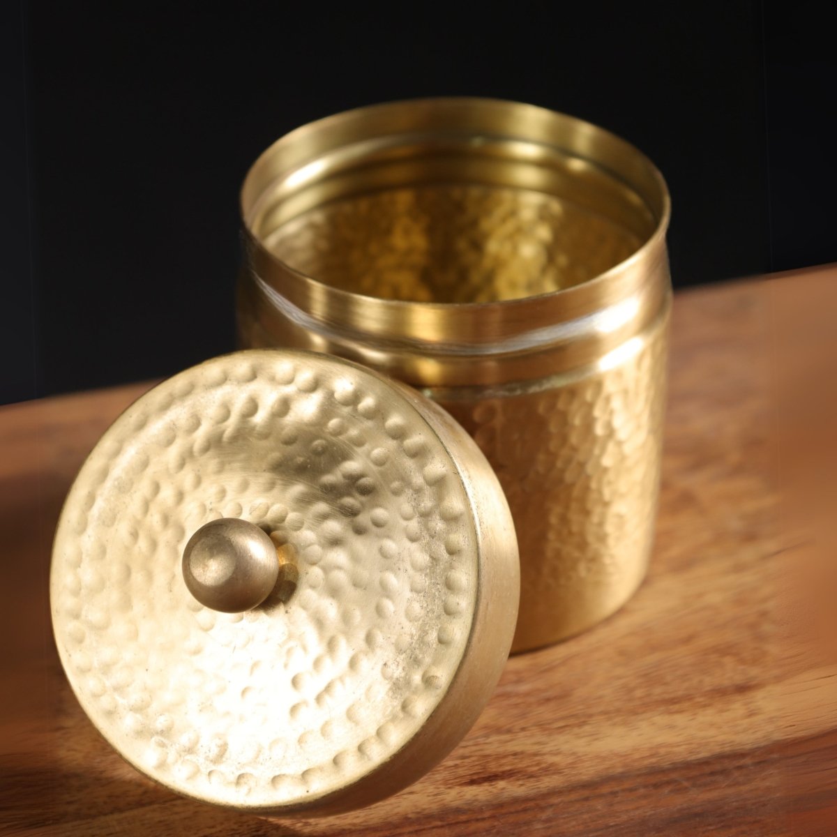 Handcrafted pure brass storage jar with traditional etching, ideal for kitchen storage, adding timeless Indian elegance.
