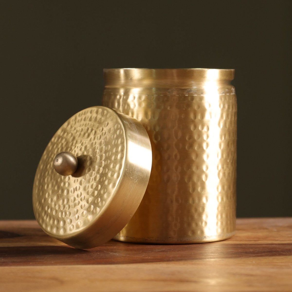 Handcrafted pure brass storage jar with traditional etching, ideal for kitchen storage, adding timeless Indian elegance.