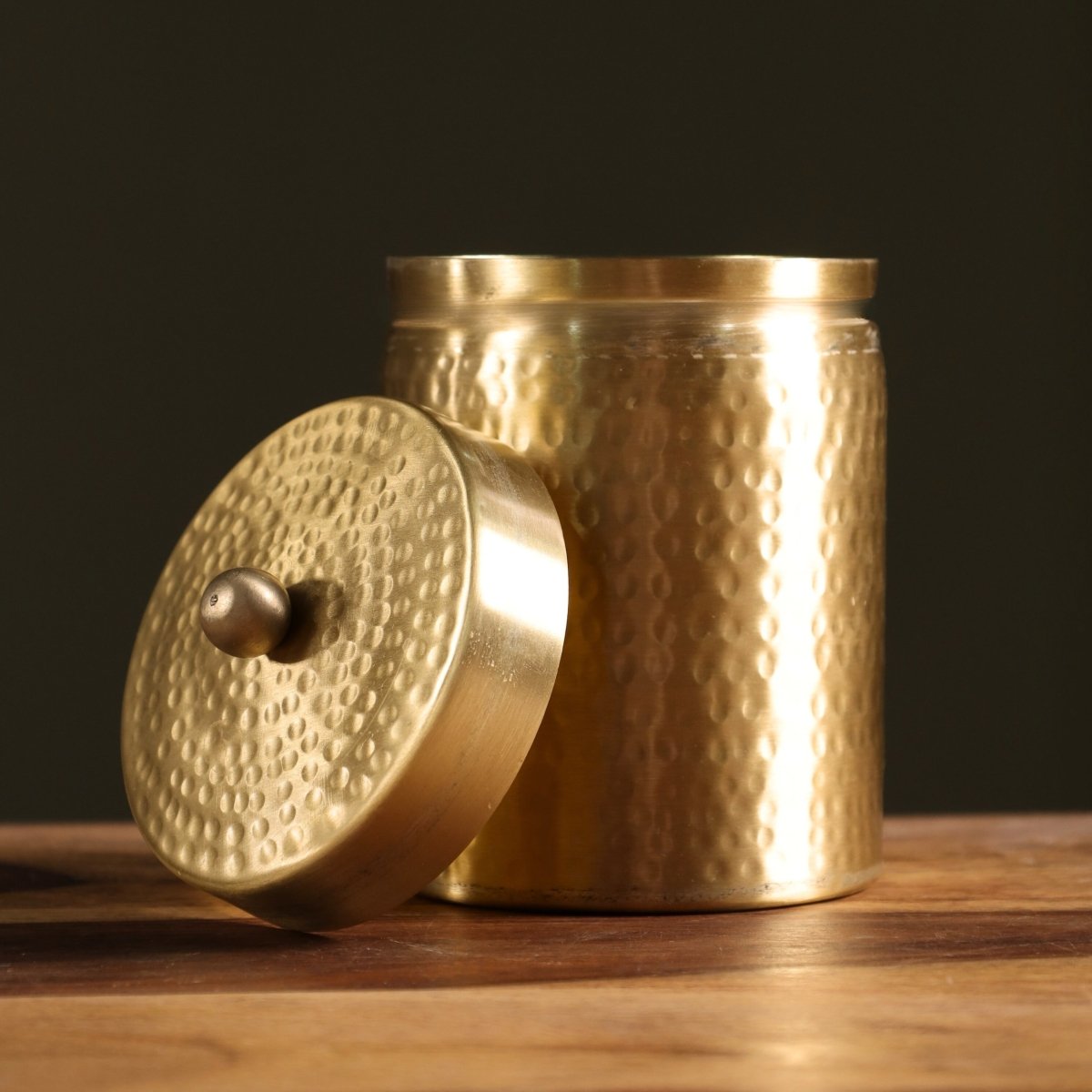 Handcrafted pure brass storage jar with traditional etching, ideal for kitchen storage, adding timeless Indian elegance.