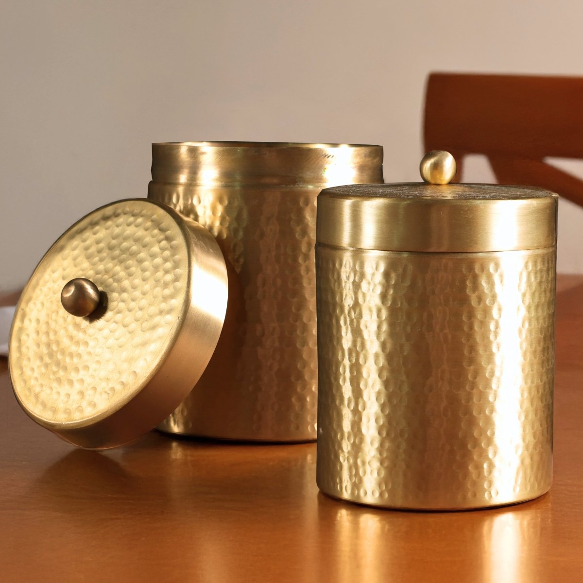 Handcrafted pure brass storage jar with traditional etching, ideal for kitchen storage, adding timeless Indian elegance.