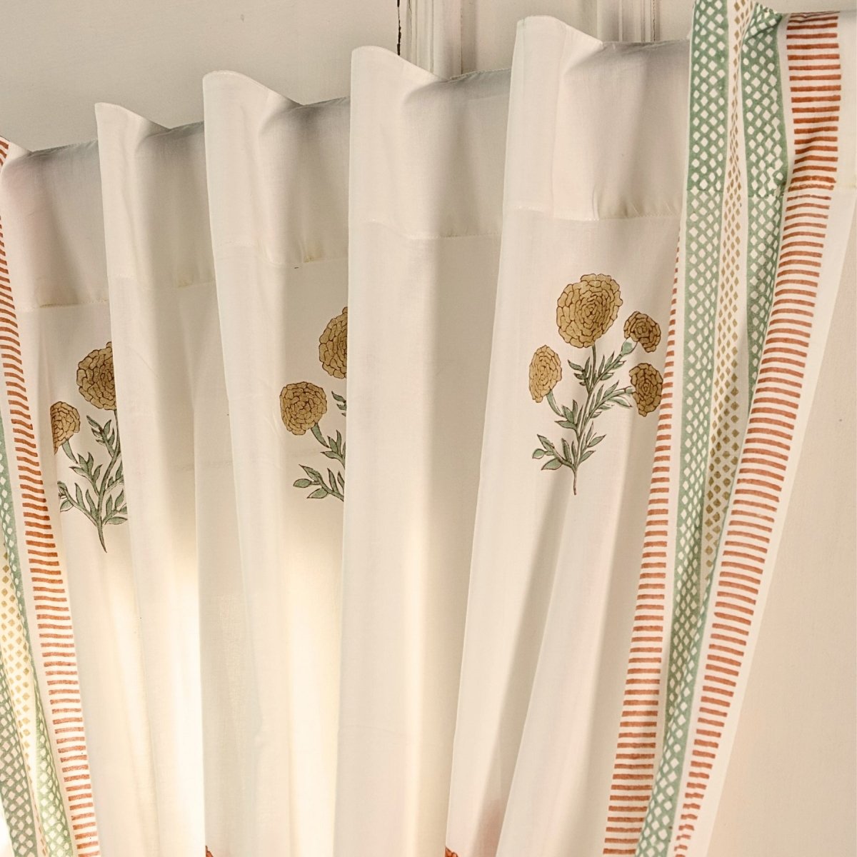 Pure Cotton Sheer Curtains in floral patterns in Rust Mustard and teal colours, available in 5ft and 7ft