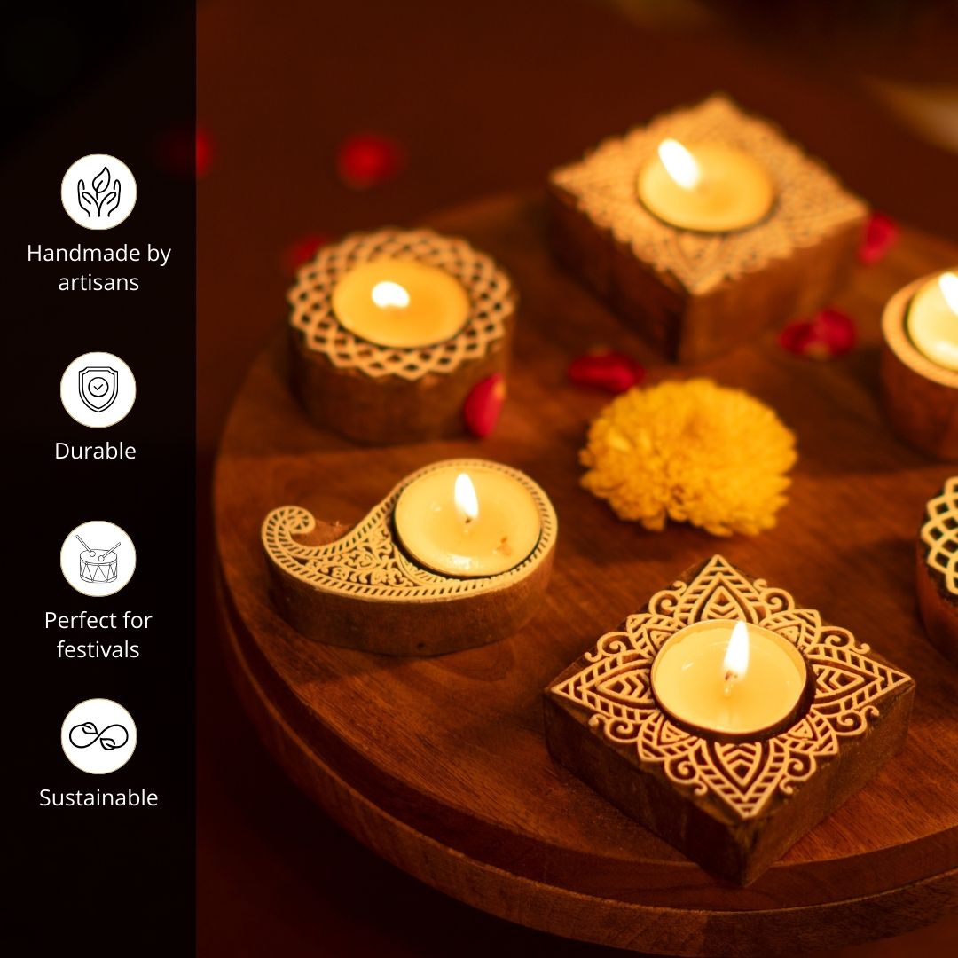 Hand-engraved mango wood diya set with tea lights in white and brown, set of 4, ideal for festive home décor and gifting.