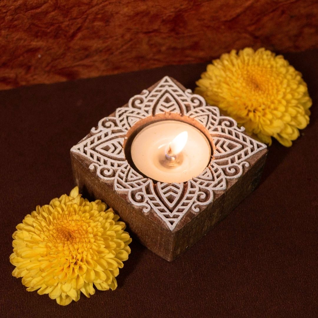 Hand-engraved mango wood diya set with tea lights in white and brown, set of 6, ideal for festive home décor and gifting.
