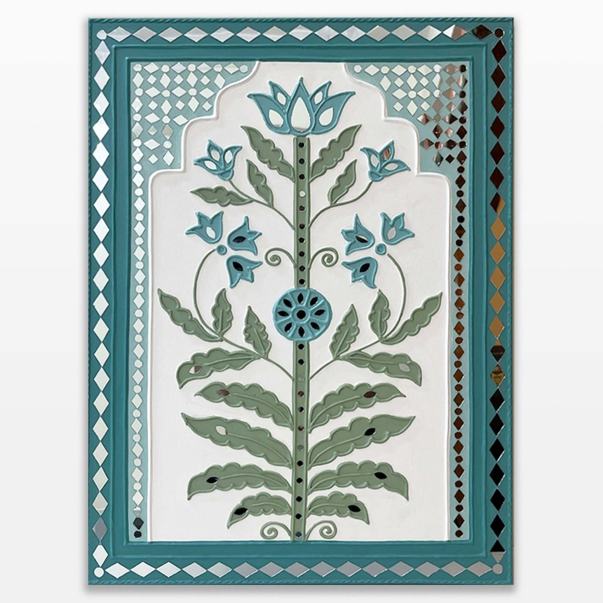 Handmade white & light green lippan wall hanging with mud and mirror work from Kutch.
