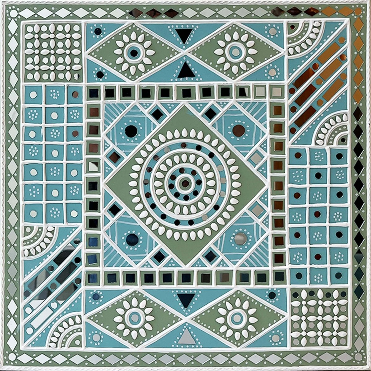 Handmade ocean blue sparkles lippan wall hanging with mud and mirror work from Kutch.