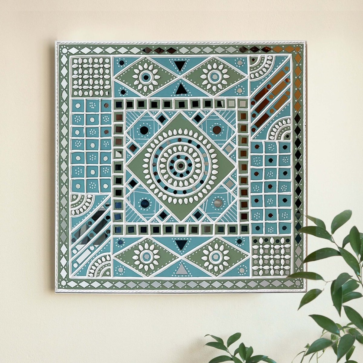 Handmade ocean blue sparkles lippan wall hanging with mud and mirror work from Kutch.
