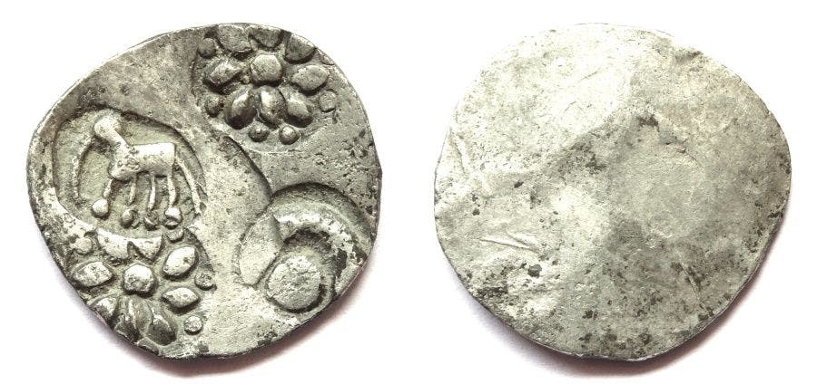 Chedi coin with an elephant standing left, symbol of sun within crescent, and flower symbol (twice); c. 400-350 BC 
