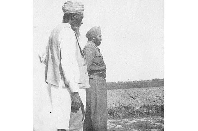 Brigadier Mohinder Singh Chopra with a Sikh farmer surveying the ‘open border’ between India and Pakistan