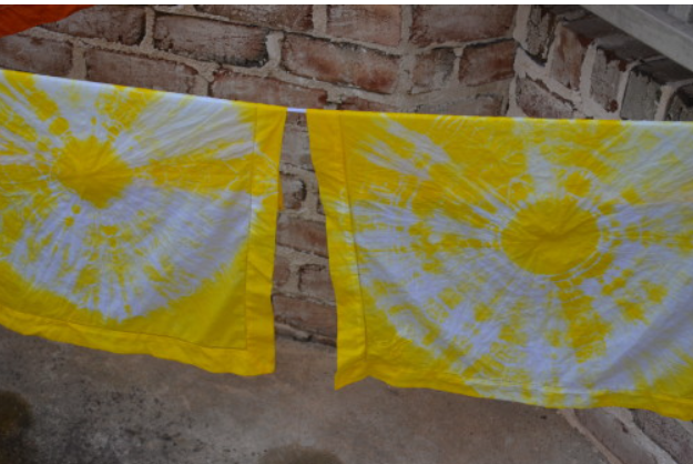 Turmeric dyed clothes being dried I Splendid Habitat