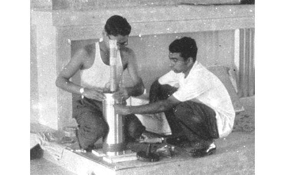 Aravamudan (in a vest) and APJ Abdul Kalam preparing a payload inside the church building in Thumba (1964)