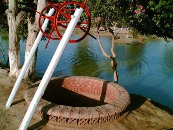 One of the two wells in Teku Park