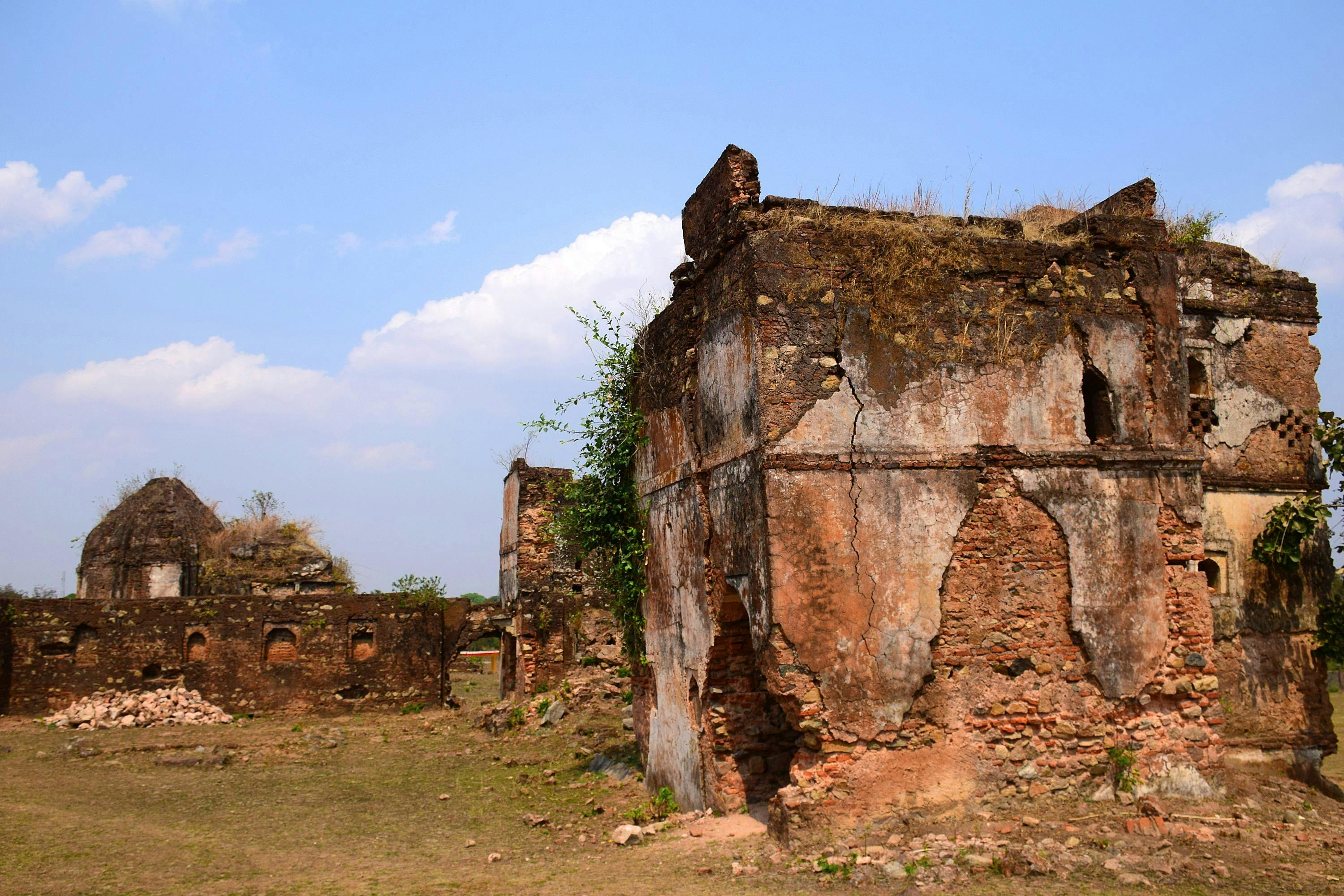 Dilapidated mansion near hexagonal temple