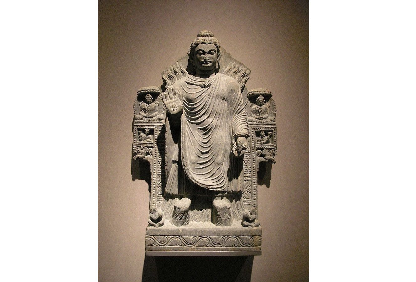 The Buddha shows miracles. Gandhara, 3rd century CE. Located in the Museum für Indische Kunst, Berlin-Dahlem