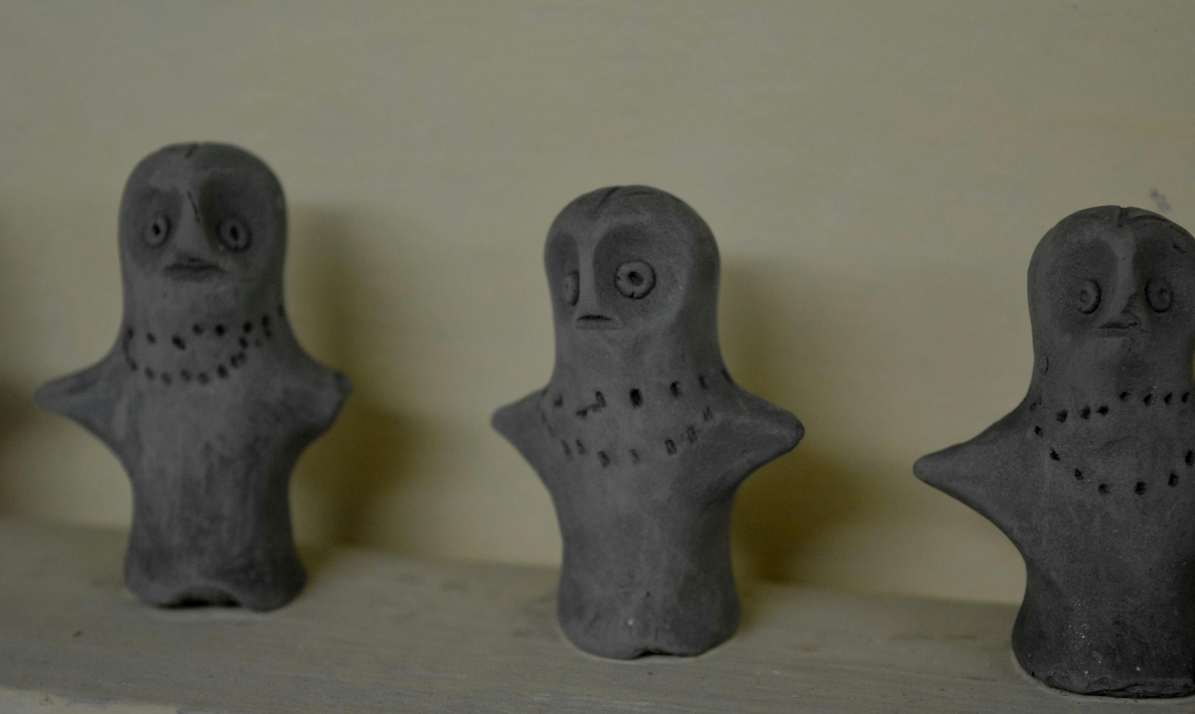 Clay dolls from his collection. He would see them as a continuation of terracotta dolls from Mohenjodaro