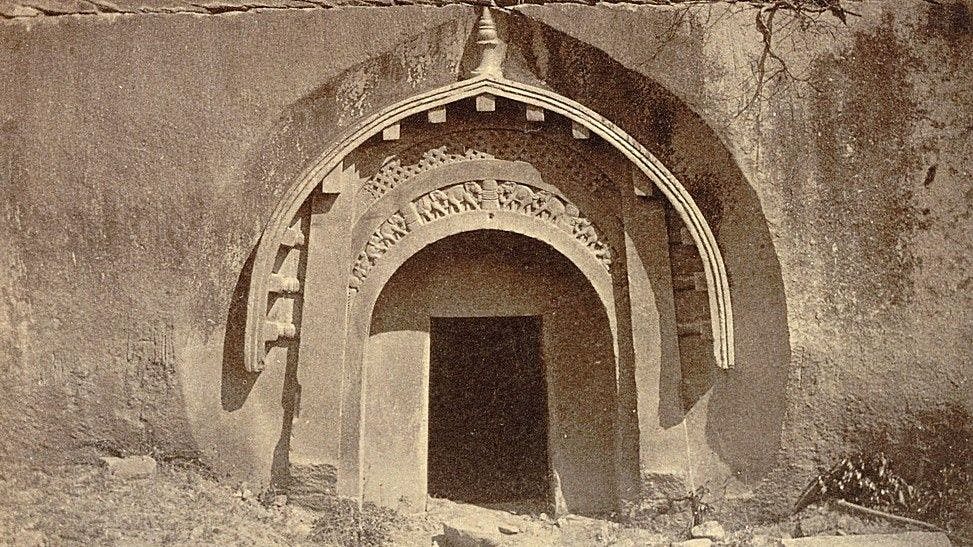 The exterior of one of the Barabar Caves in 1870