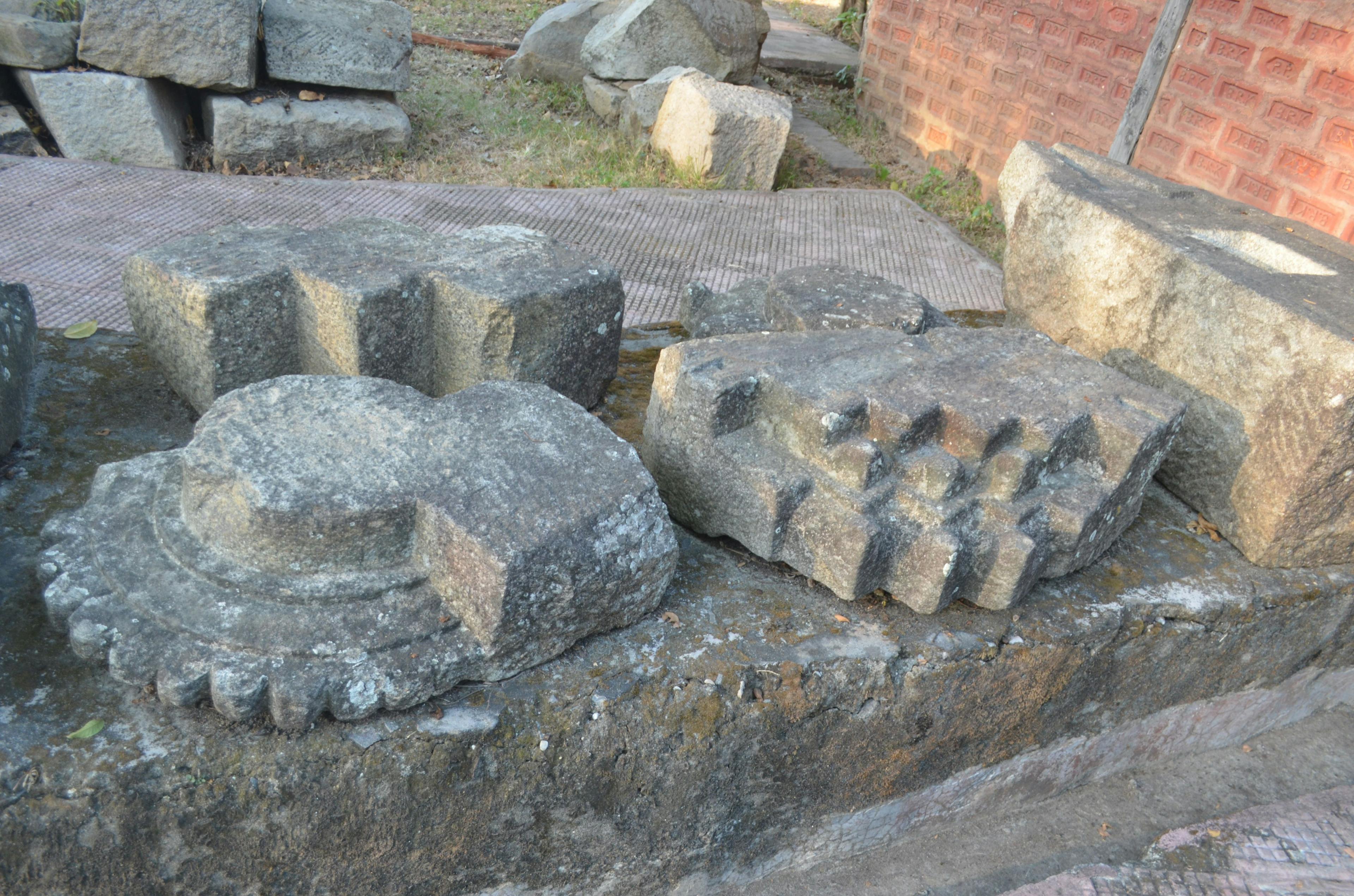 Many such broken sculptures lie around the complex