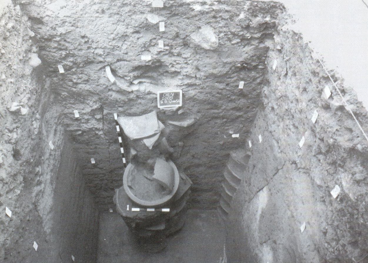 Excavated trench showing occurence of two ringwells
