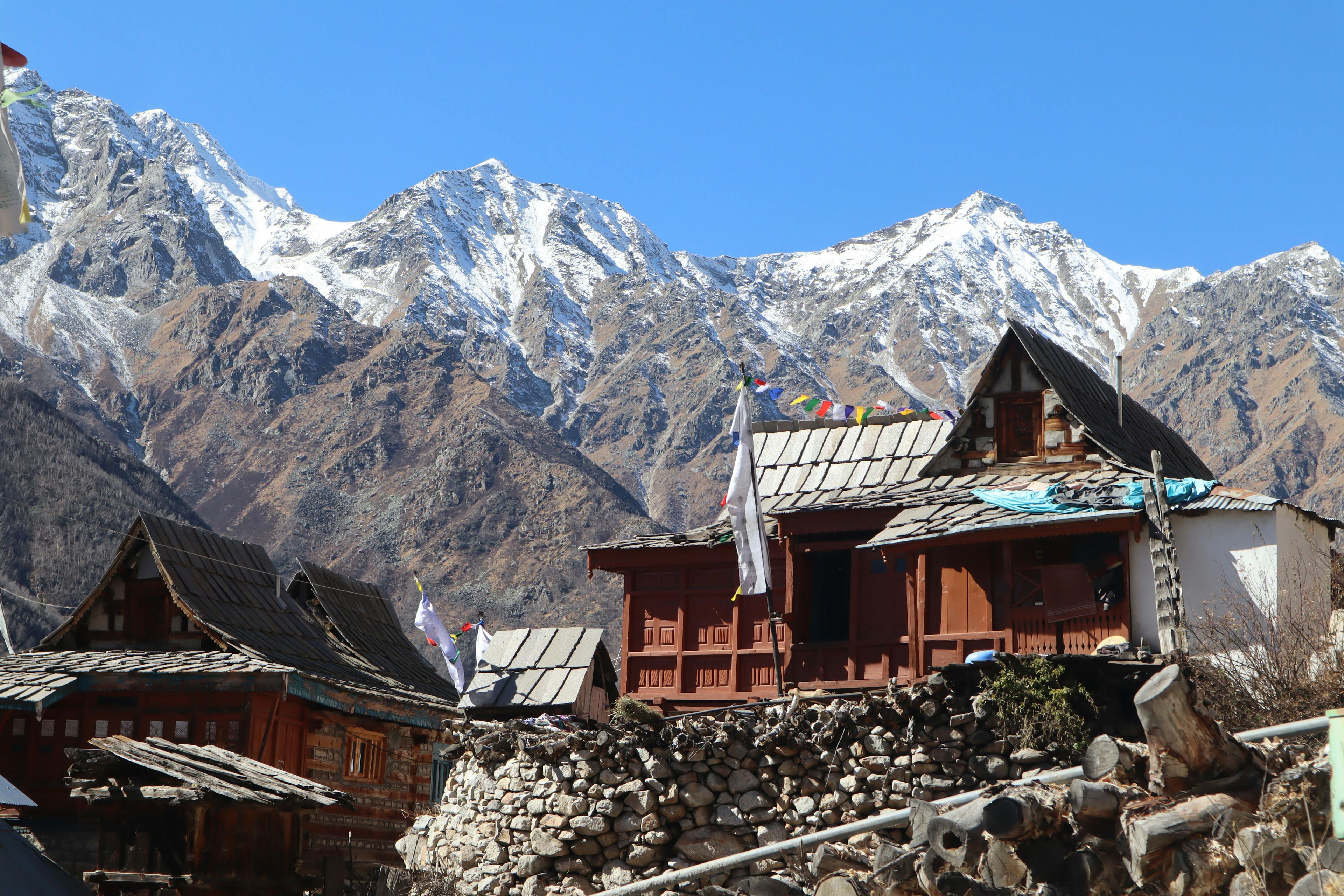 Vernacular houses with the Himalayas in the background