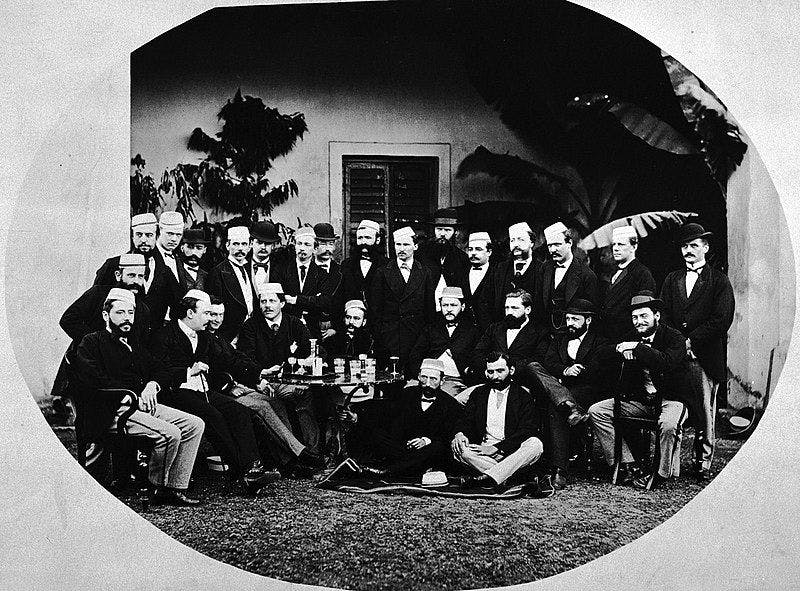 Group portrait of 26 men celebrating Christmas in Calcutta,1869