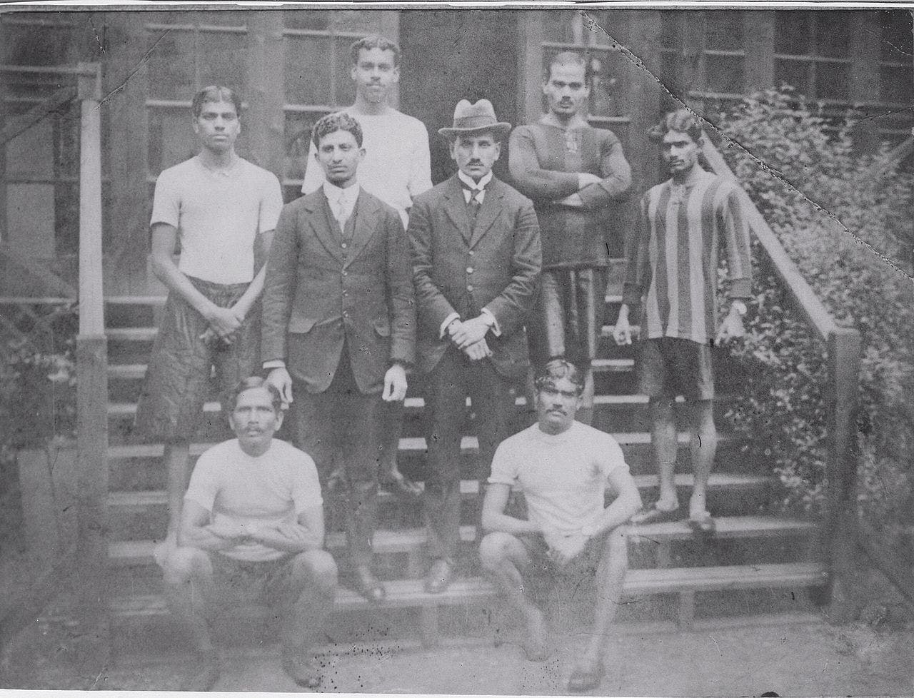Indian Olympic delegation 1920: (top row, l-to-r:) Shindes, Bannerjee, Navale, Chaugule; (middle:) Bhoot, Fyzee; (seated:) Datar, Kaikadi