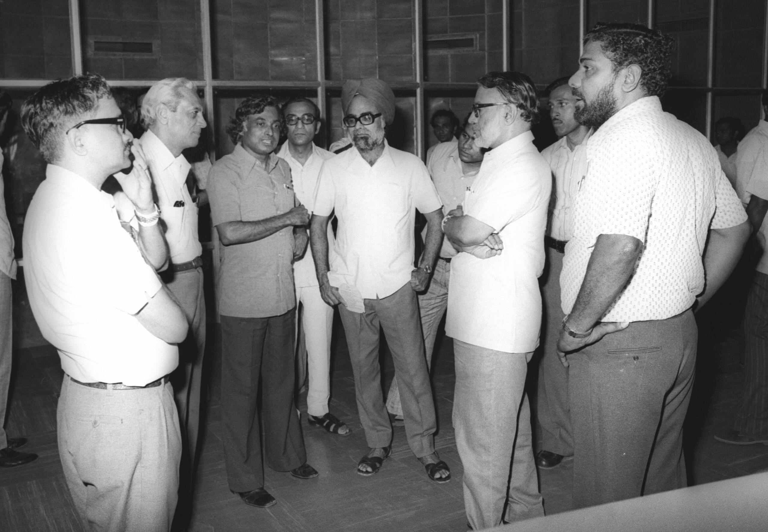 APJ Abdul Kalam briefing the Space Commission members in SHAR (8 August 1978). From left: Col N Pant, Satish Dhawan, Kalam, (not identified), Manmohan Singh, (partially seen, not identified), MGK Menon, K Narayana and R Jayamani. It is interesting to note that later, Kalam became the President of India and Manmohan Singh, the Prime Minister 
