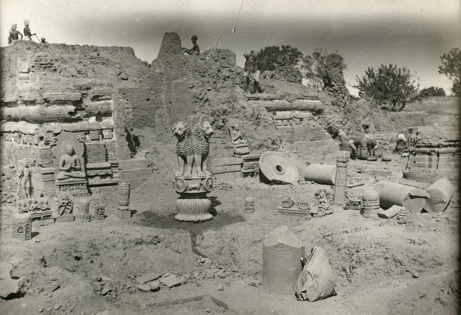 Excavation at Sarnath, pieces of Ashoka’s pillar and his lion capital as well as statues of Buddha can be seen in the photo
