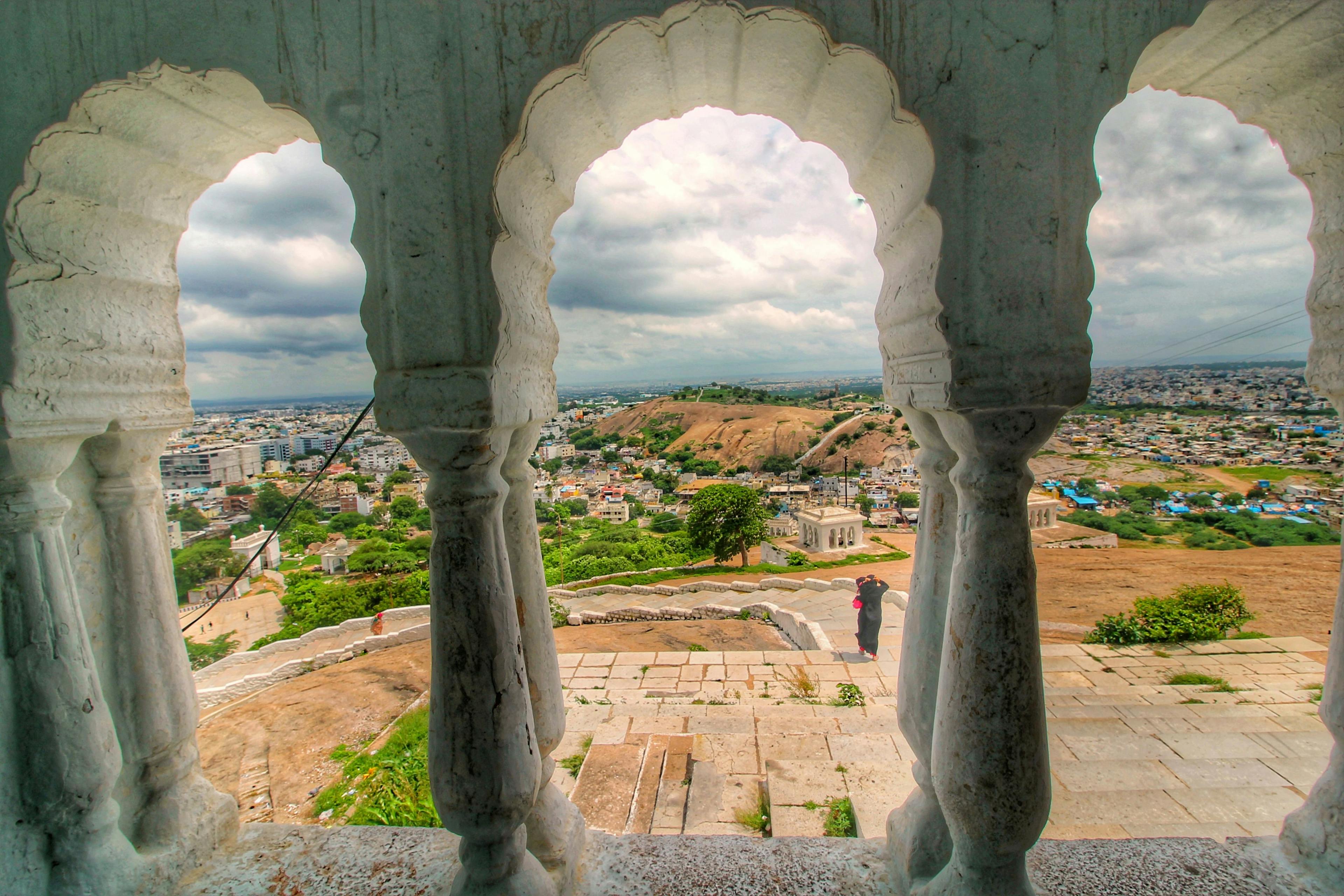 Standing behind arches on the dome-shaped hillock, from Moula Ali hill one can get stunning views of Hyderabad and its twin city, Secunderabad