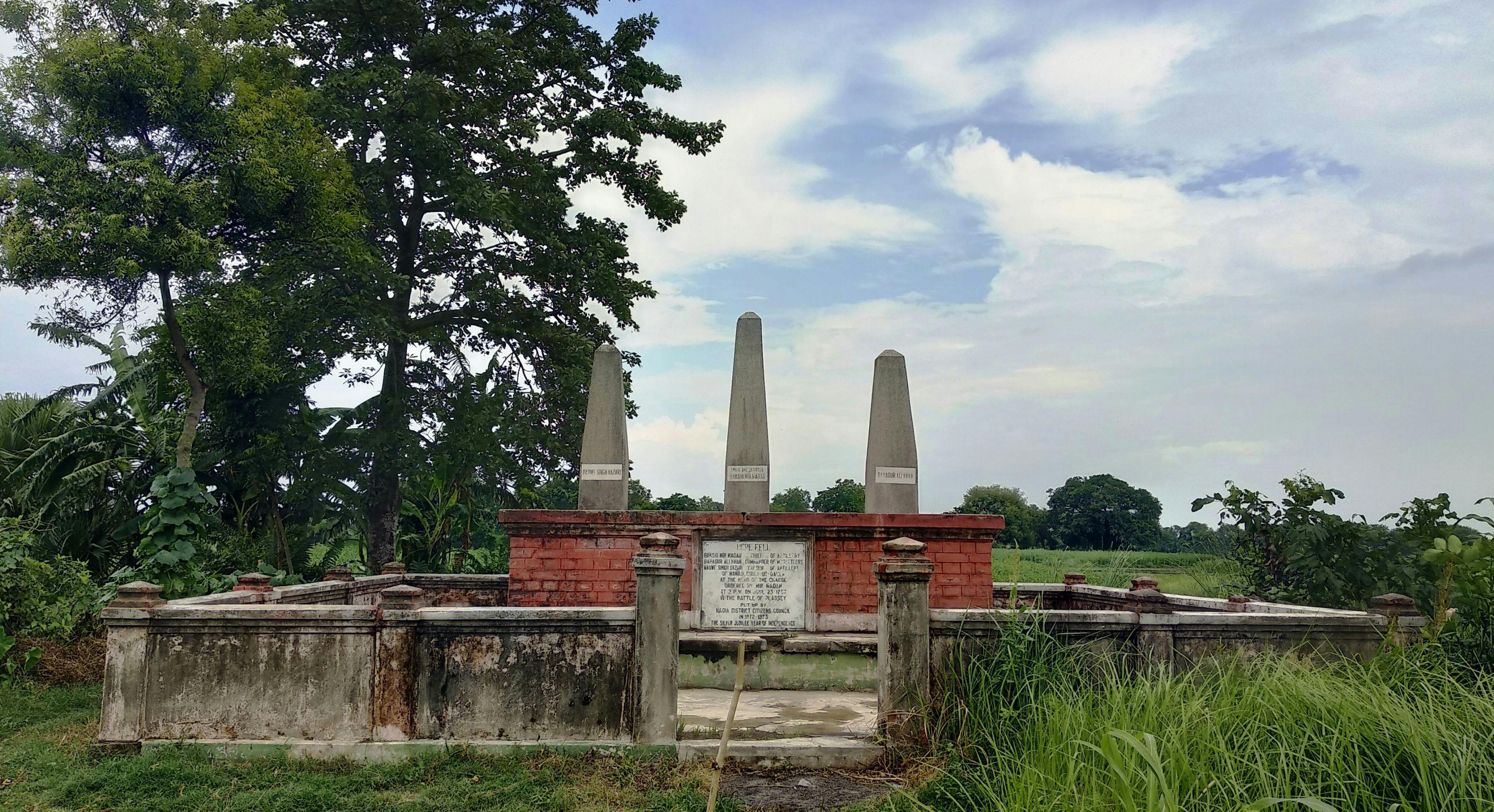A set of three Obelisks of martyr Mir Madan, Nauwe Singh Hazari and Bahadur Khan were erected near Plassey battlefield (1972-1973) by the Nadia District Citizens Council