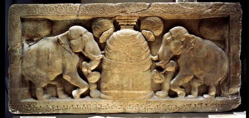 The Ramagrama Stupa covered in Nagas and being worshipped by Elephants, Amravati 