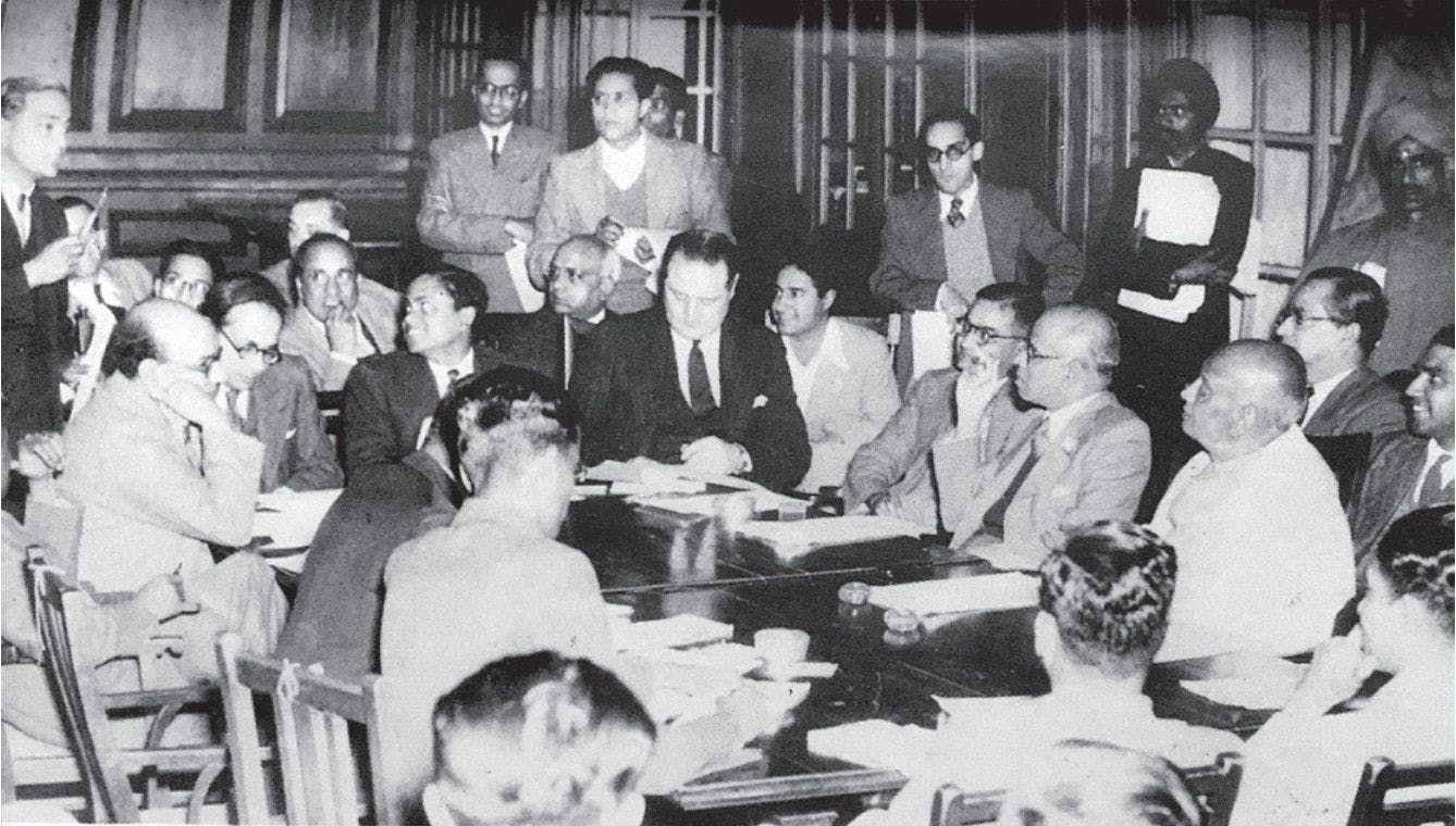 Sardar Patel reviews the constitutional progress of Indian states at a press conference in New Delhi on 29 January, 1948. Seen on Sardar's right is VP Menon