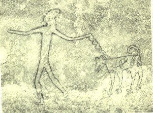 Bhimbetka rock painting of a man with a dog