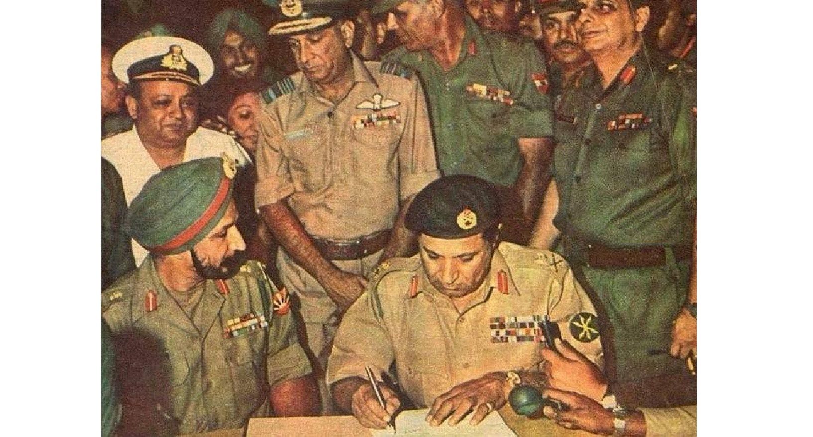 Lt Gen Sagat Singh second from the top right, Lt Gen J S Aurora, GOC-IN-C, Eastern Command and Lt Gen A A K Niazi of Pakistan army signing the surrender documents in Dhaka on Dec 16, 1971. Vice Admiral N Krishnan, Air Marshal H C Dewan. Maj. Gen. J FR Jacob are also seen in the picture.