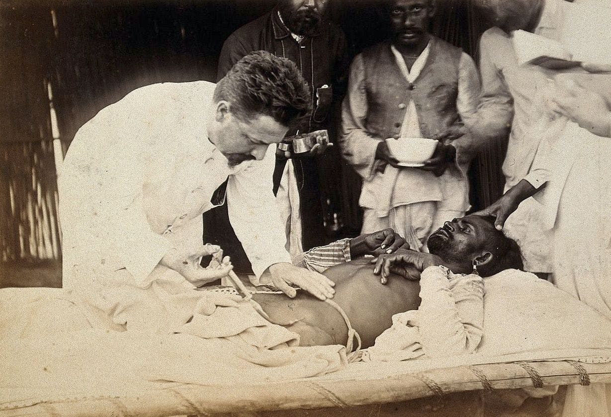 Man being injected by doctor, during the outbreak of bubonic, 1897