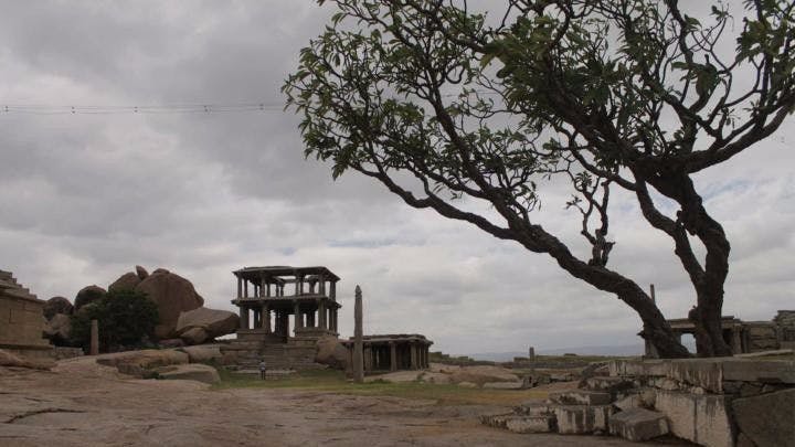 At the Hemakuta hills that look over the ruins of Hampi on one side, Virupaksha temple on the other.