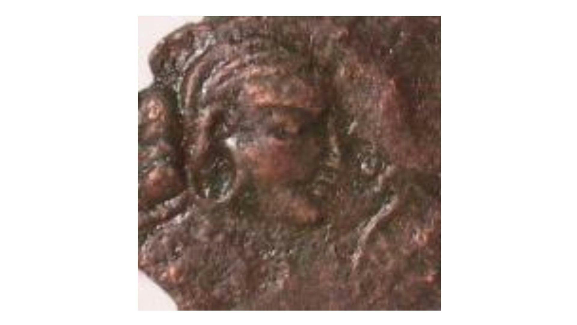 Image of a Hunnic Queen on a bronze coin of Kashmir Smast (Pakistan/ Gandhara, c. 375-400).