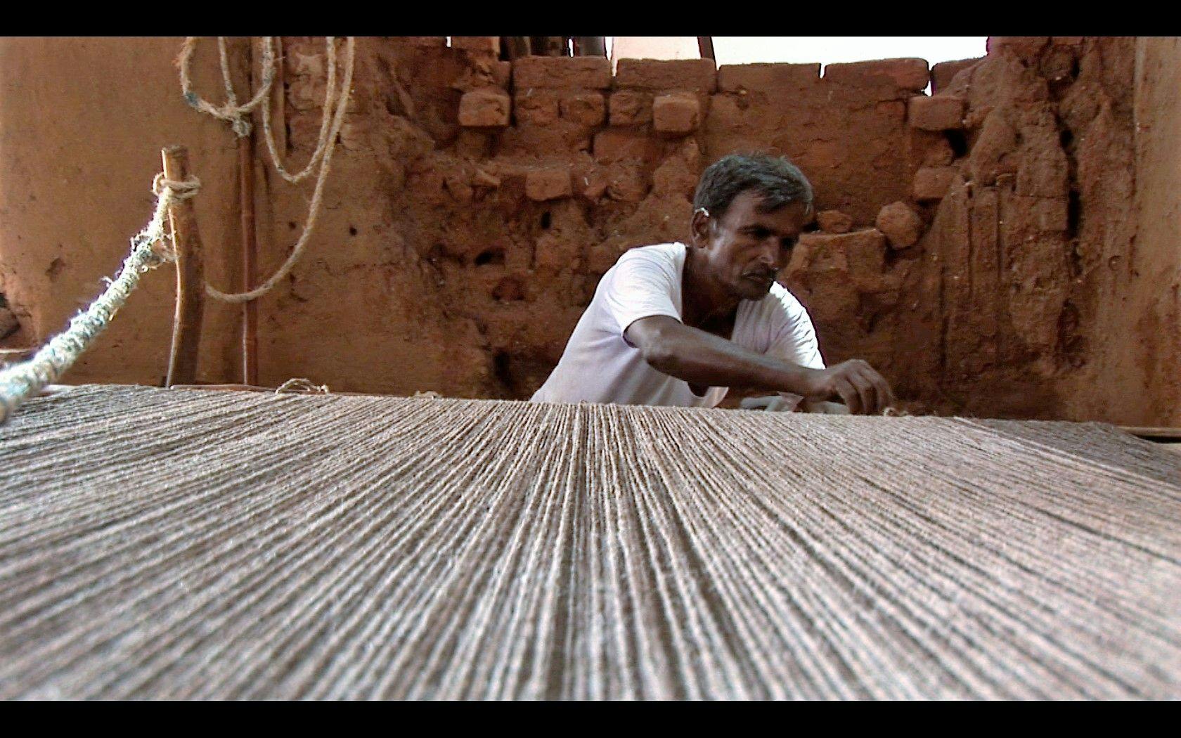 “The loom is of the same simple structure with that usual in India.”