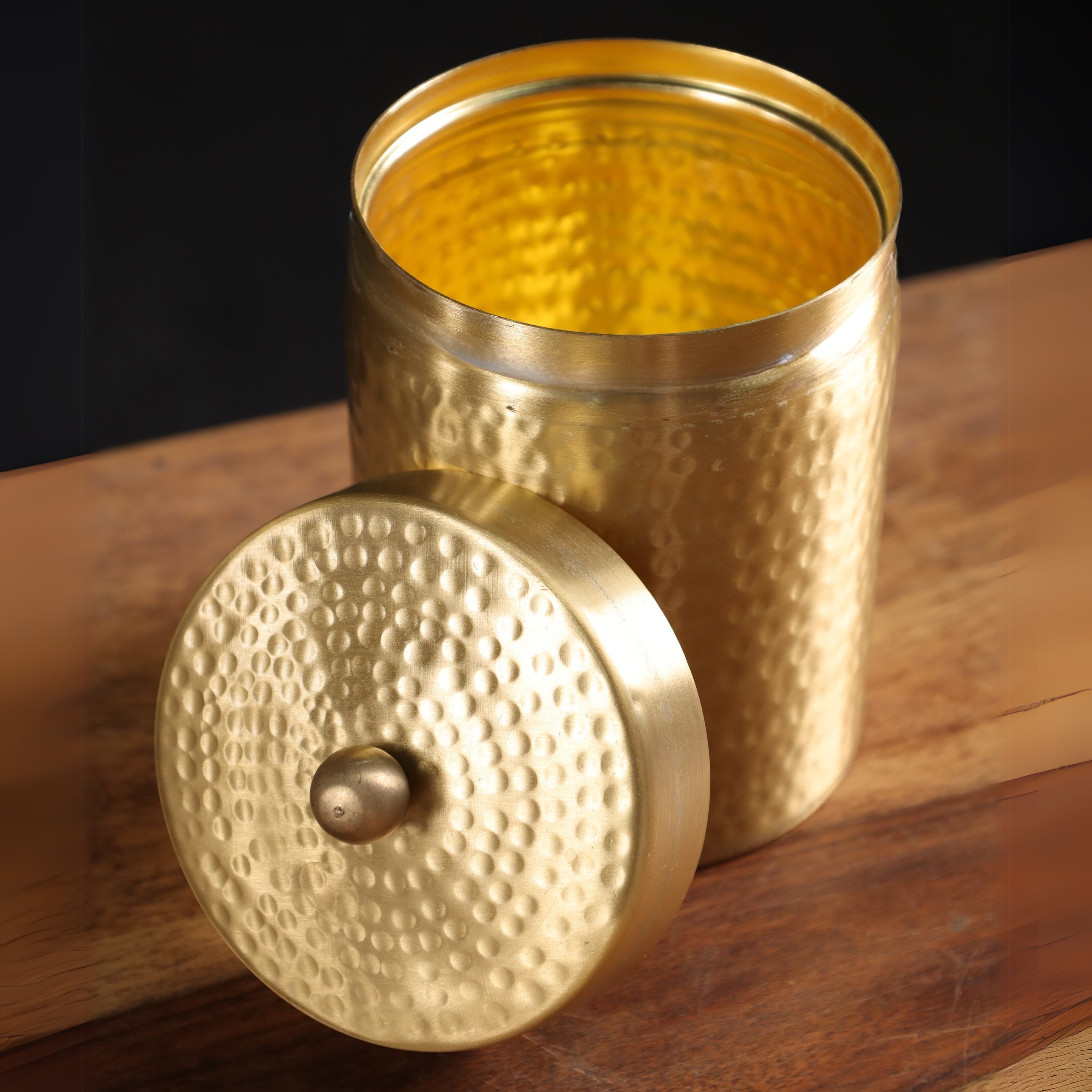 Handcrafted pure brass storage jar with traditional etching, ideal for kitchen storage, adding timeless Indian elegance.