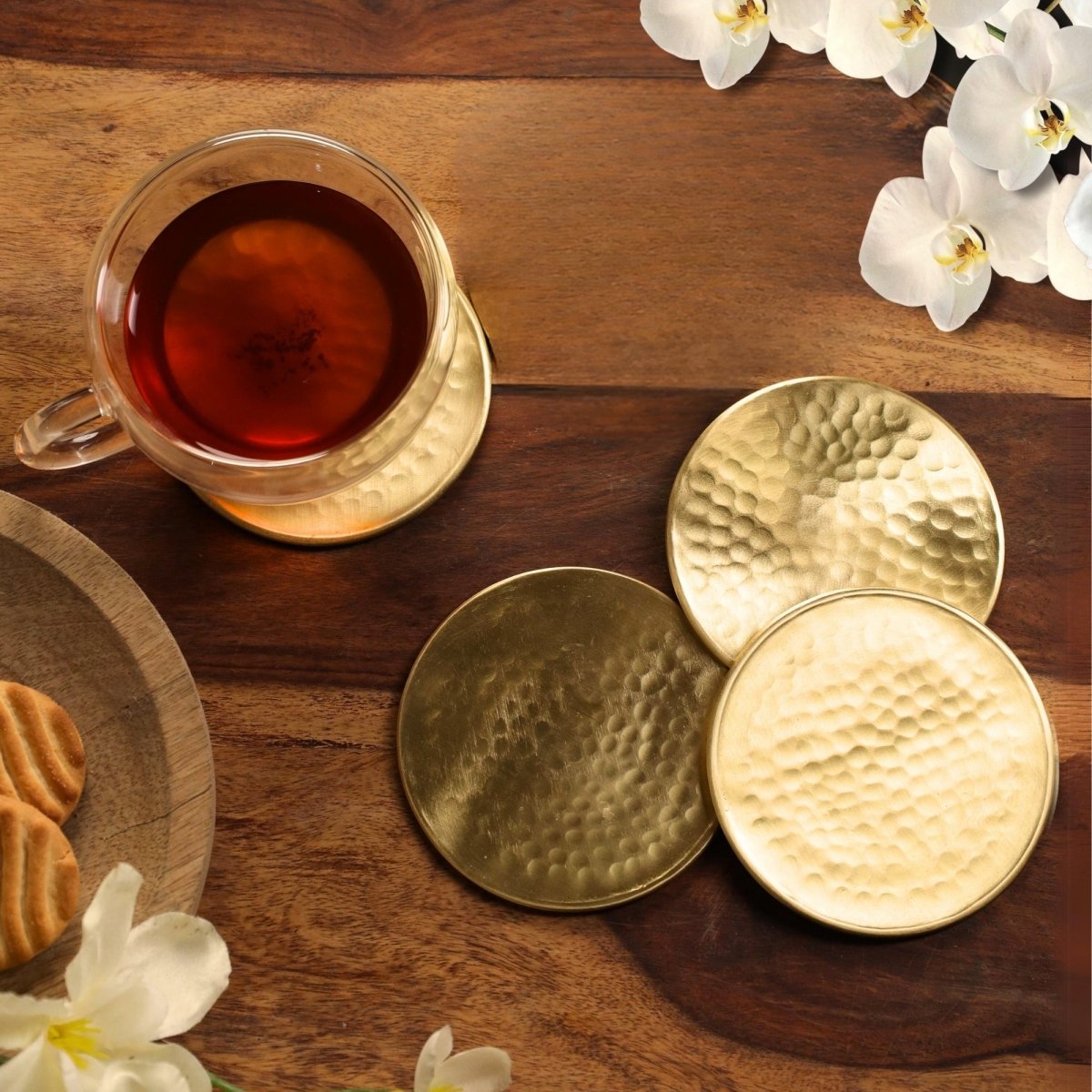 Handcrafted Pure Brass table coaster set with traditional etching, ideal for kitchen and table, adding timeless Indian elegance.