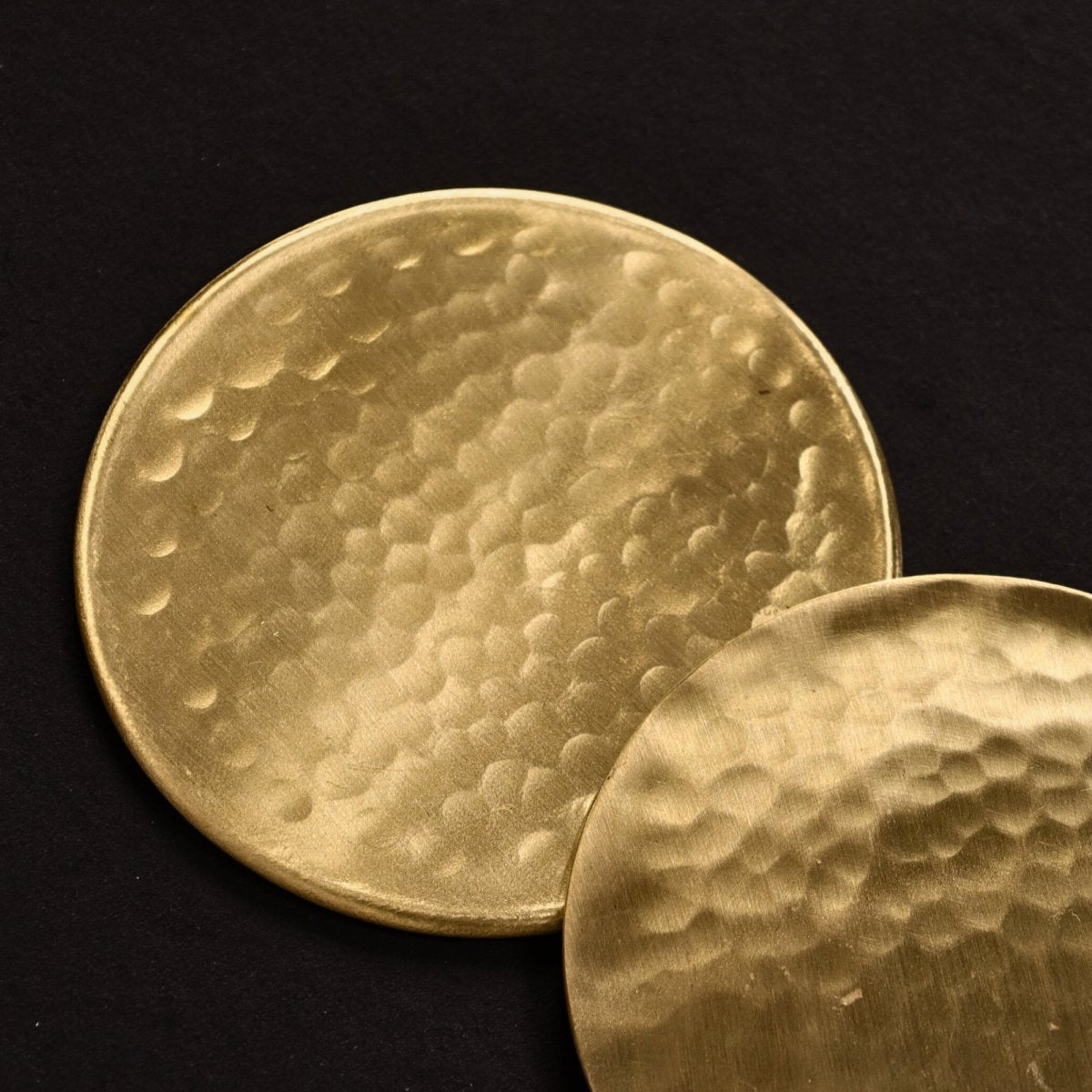Handcrafted Pure Brass table coaster set with traditional etching, ideal for kitchen and table, adding timeless Indian elegance.
