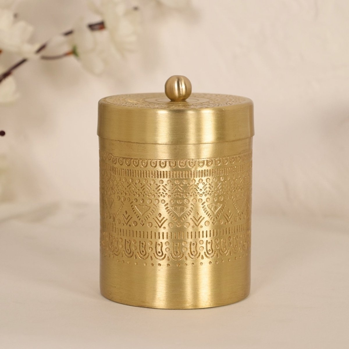 Handcrafted pure brass storage jar with traditional etching, ideal for kitchen storage, adding timeless Indian elegance.