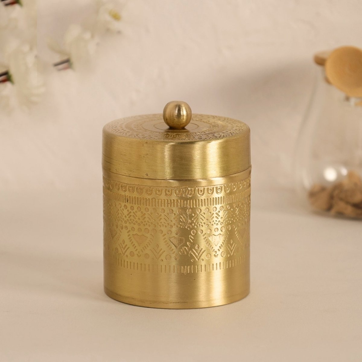Handcrafted pure brass storage jar with traditional etching, ideal for kitchen storage, adding timeless Indian elegance.