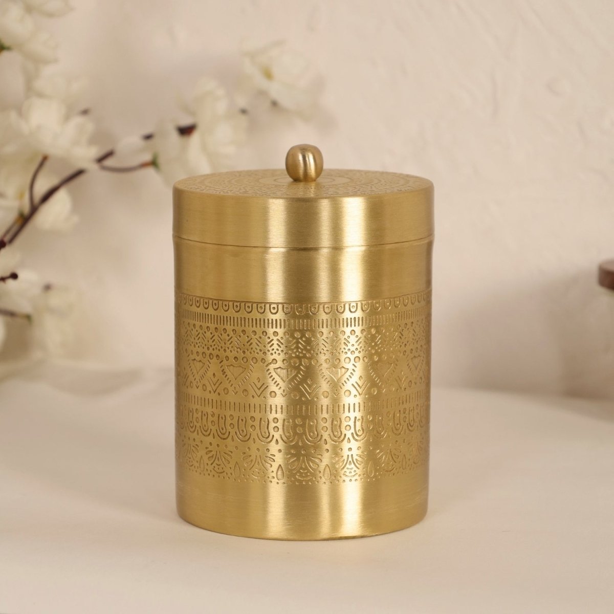 Handcrafted pure brass storage jar with traditional etching, ideal for kitchen storage, adding timeless Indian elegance.