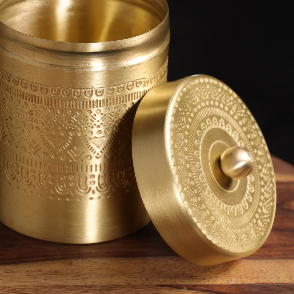 Handcrafted pure brass storage jar with traditional etching, ideal for kitchen storage, adding timeless Indian elegance.
